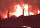 Probably fire of distillery in 1936. Postcard.
