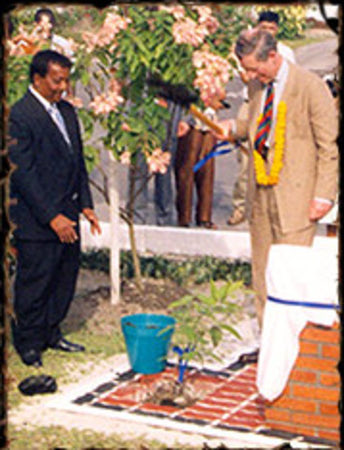 His Royal Highness, Prince of Wales, Prince Charles plants a India Laburnum Tree (Cassia Fistula) in the compound of DDL, to commemorate his visit to the company.